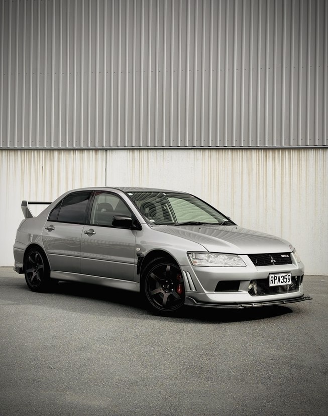 Silver Japanese performance car photographed on arrival